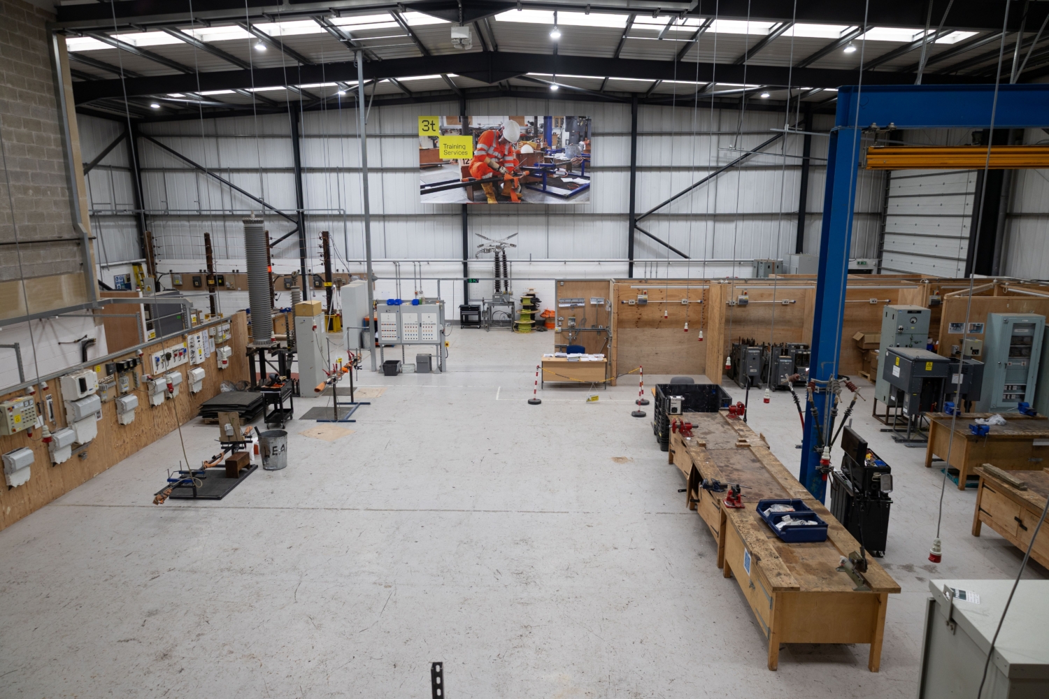 Internal photo of building with utility training equipment 