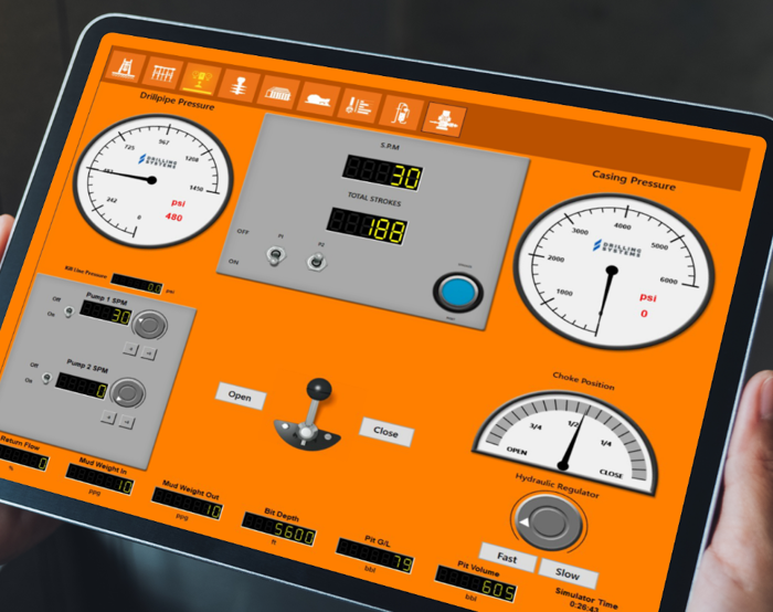 Close-up of a person holding a tablet displaying a control panel with various gauges, dials, and indicators for monitoring and adjusting dropline pressure, casting pressure, and choke position.